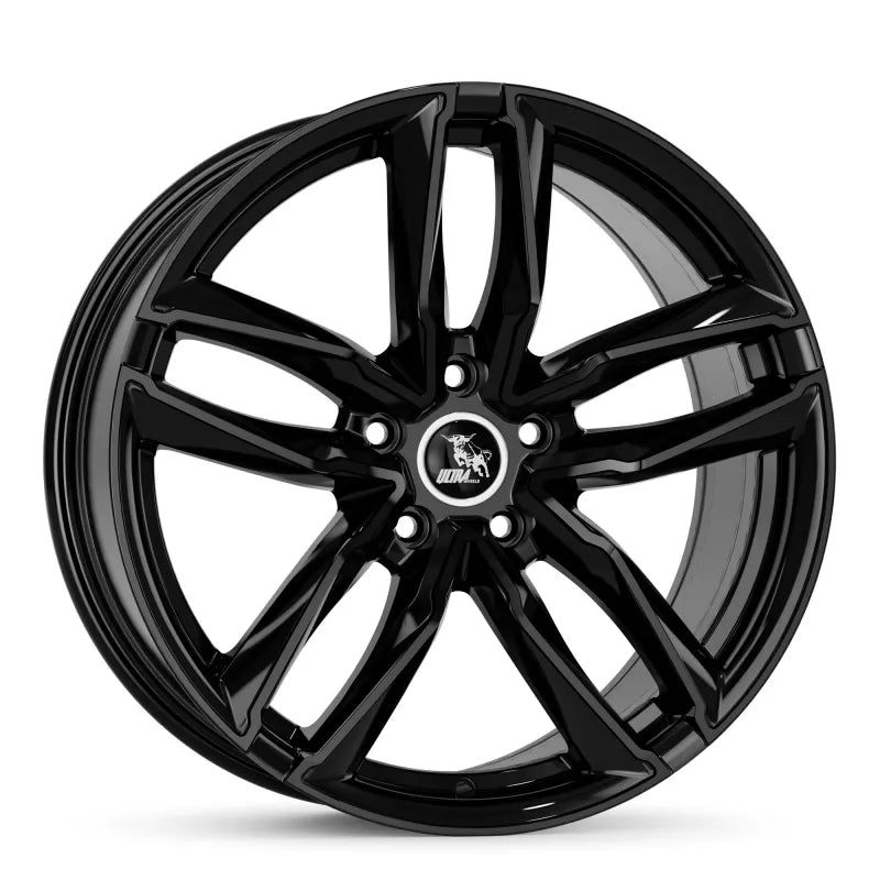 A sleek black alloy wheel with a modern design.